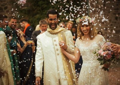 A confetti throw at an Indian Scottish fusion wedding at Fingask Castle