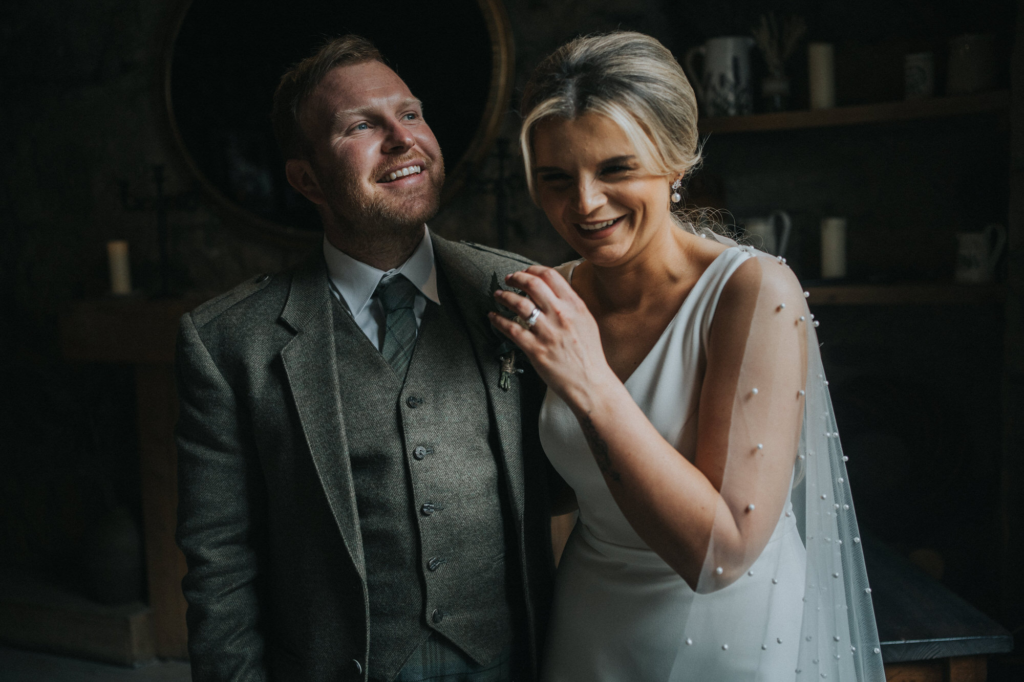 The Bothy, Glasgow - A bride and groom laugh on their wedding day