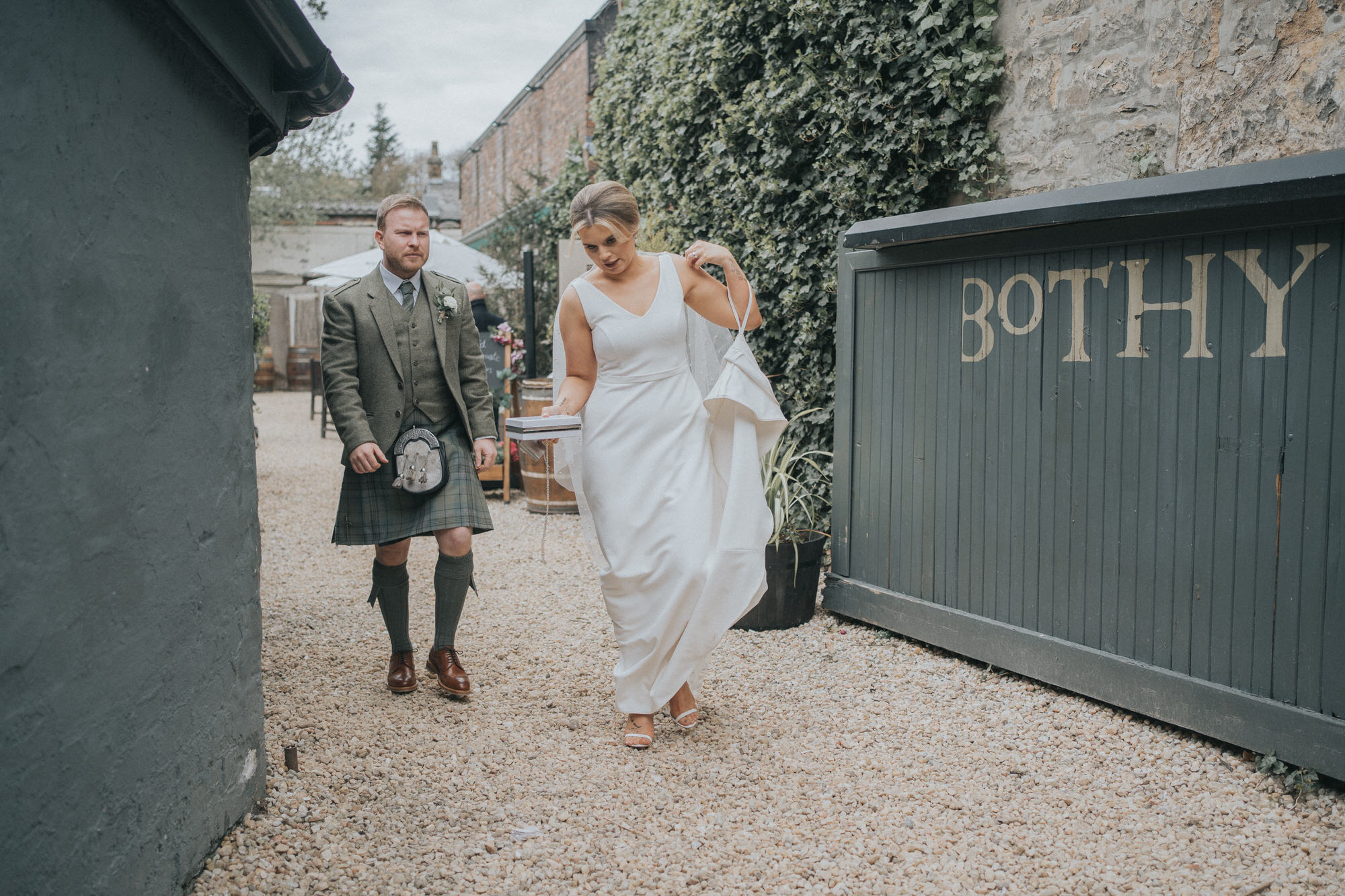 The bride and groom leave at The Bothy, Glasgow