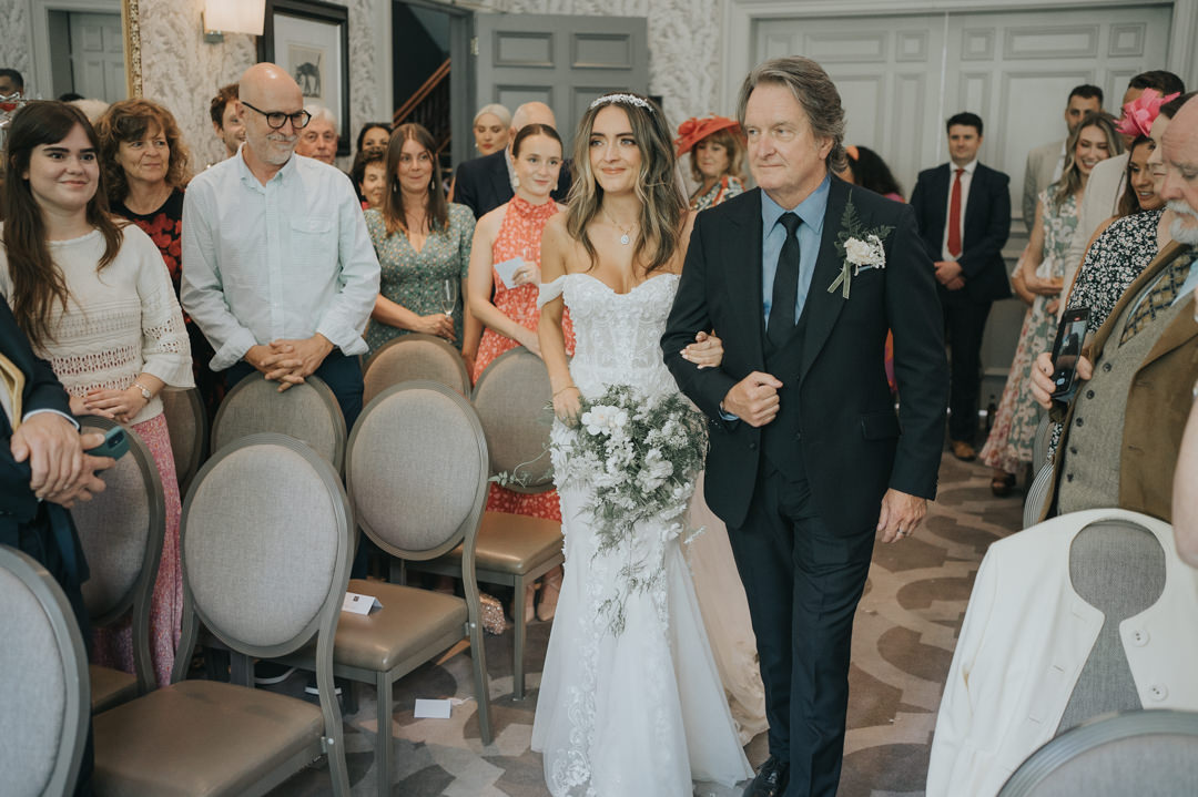 The bride and her Dad walk down the aisle of Hotel Du Vin, Glasgow to meet her husband to be